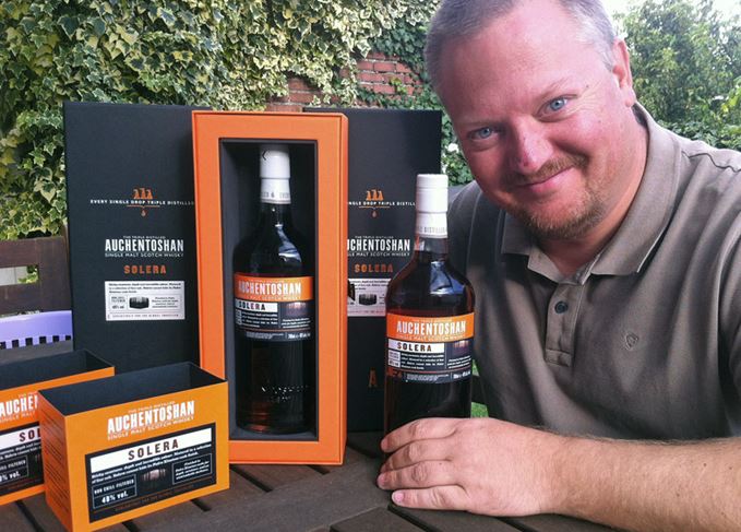 Whisky collector Mark Dermul with some bottles of Auchentoshan from his collection. 