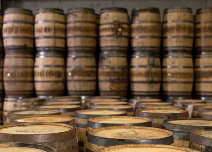 Rows of stacked whisky casks