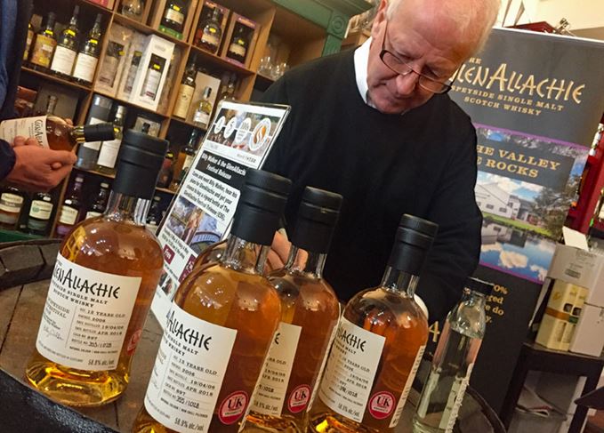 Billy Walker signs GlenAllachie bottles