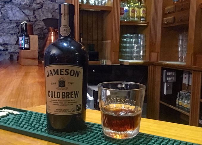 Jameson Cold Brew Irish whiskey coffee bottle with glass