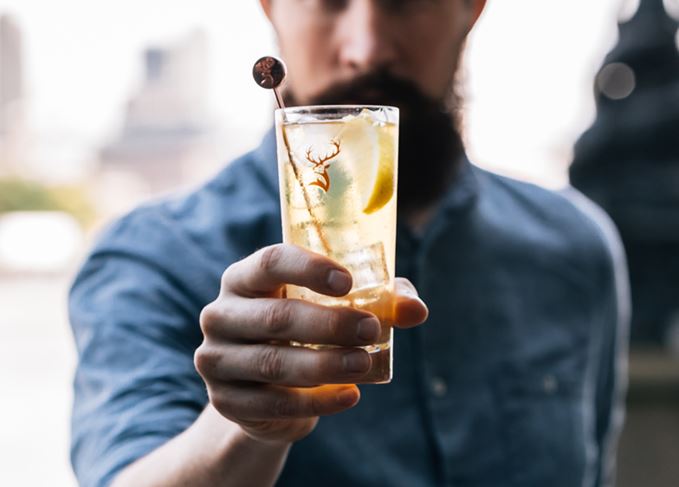 Man holding Highball