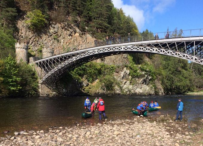 Canoeing down the Spey River at the Spirit of Speyside Whisky Festival