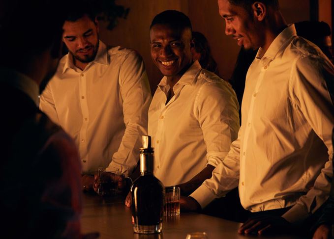 Manchester United players Sergio Romero, Antonio Valencia and Chris Smalling enjoying Chivas Regal