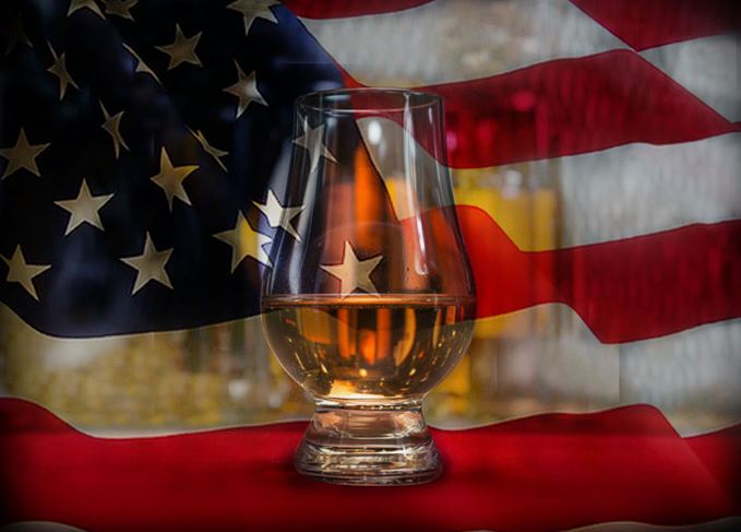 Scotch whisky glass and an American flag