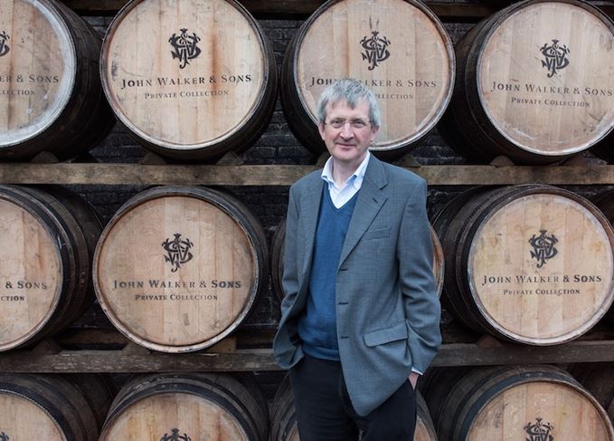 Jim Beveridge with John Walker whisky casks